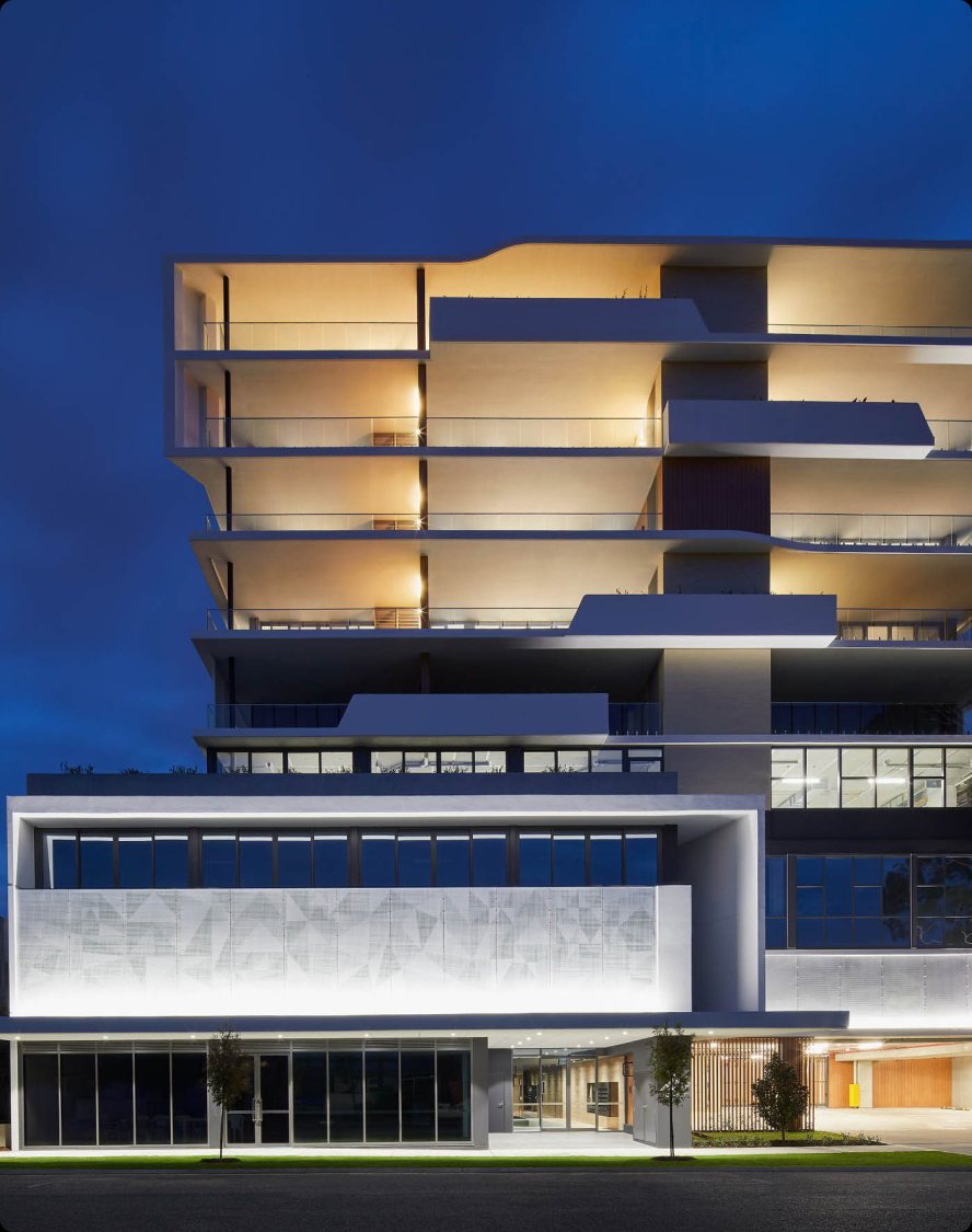 An Icon project building at dusk