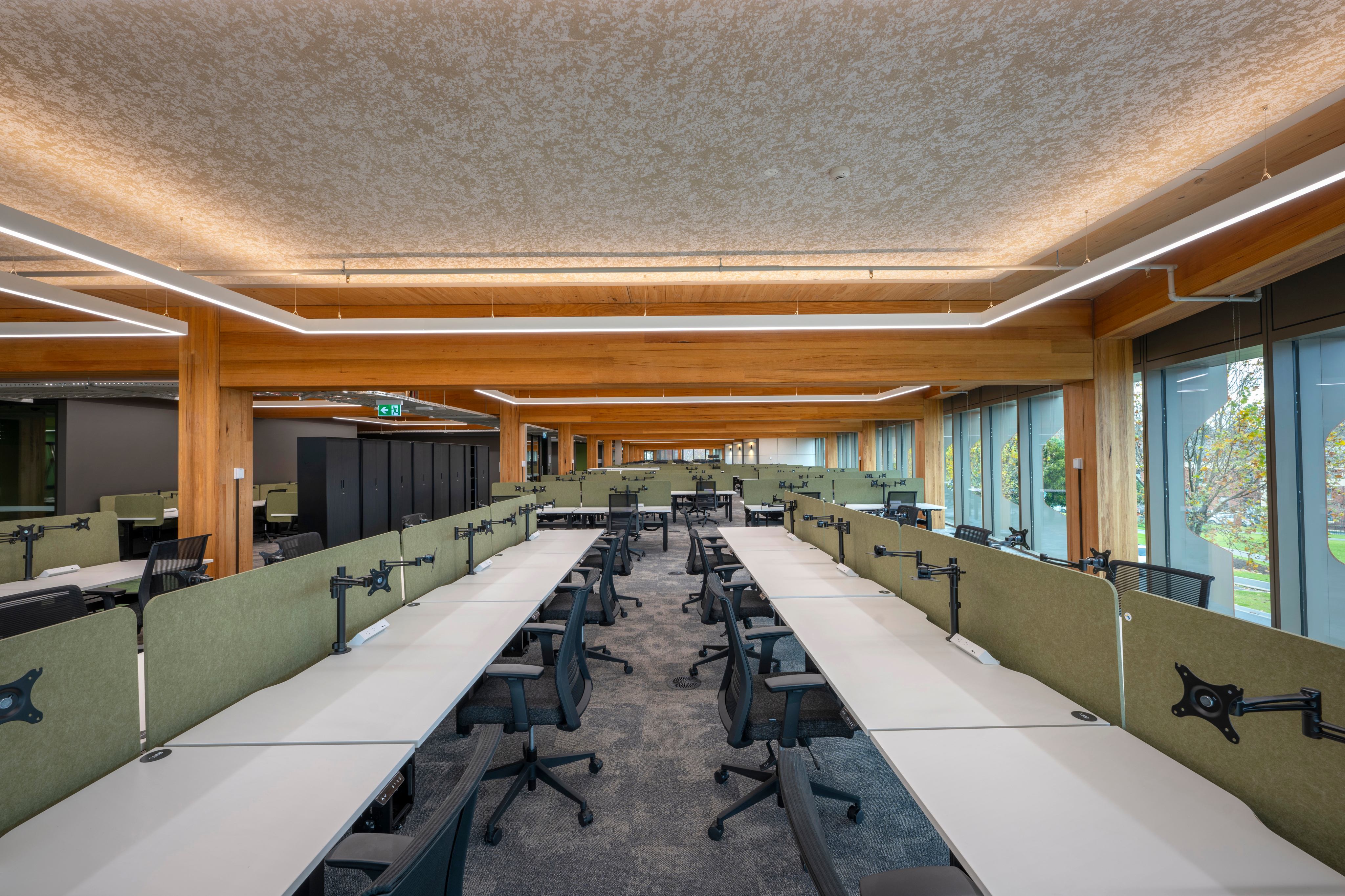 Customer service floor with exposed timber beams