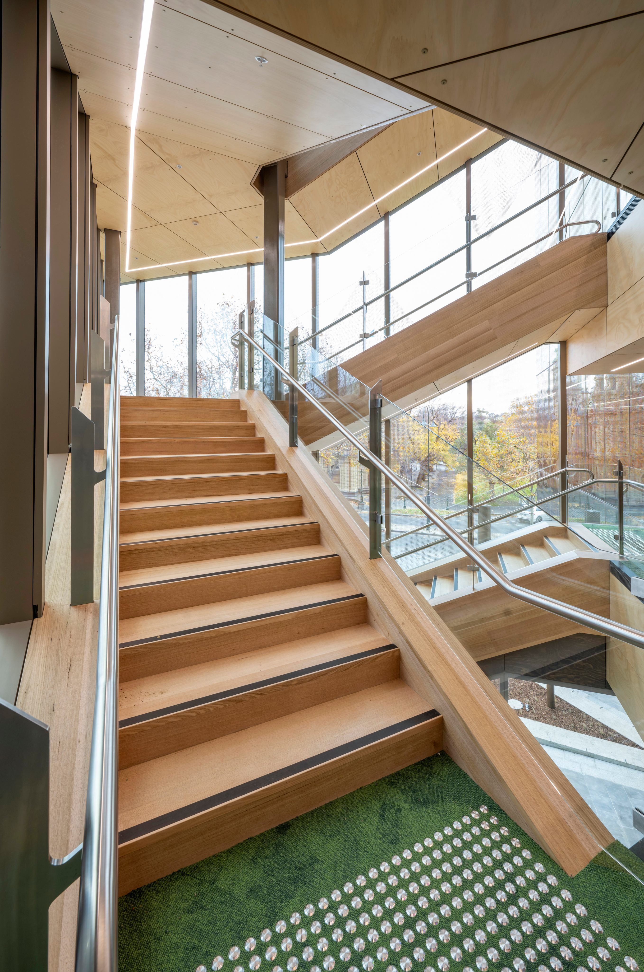 Mass timber stairwell connecting the building's four levels