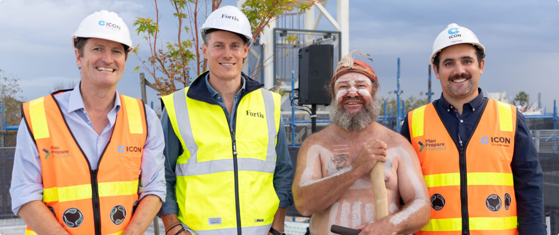 Icon and Fortis site team members with a Traditional Owner at a project site